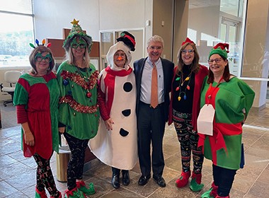 HR in holiday outfits with Jim Landen