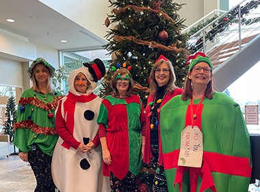 HR in holiday outfits