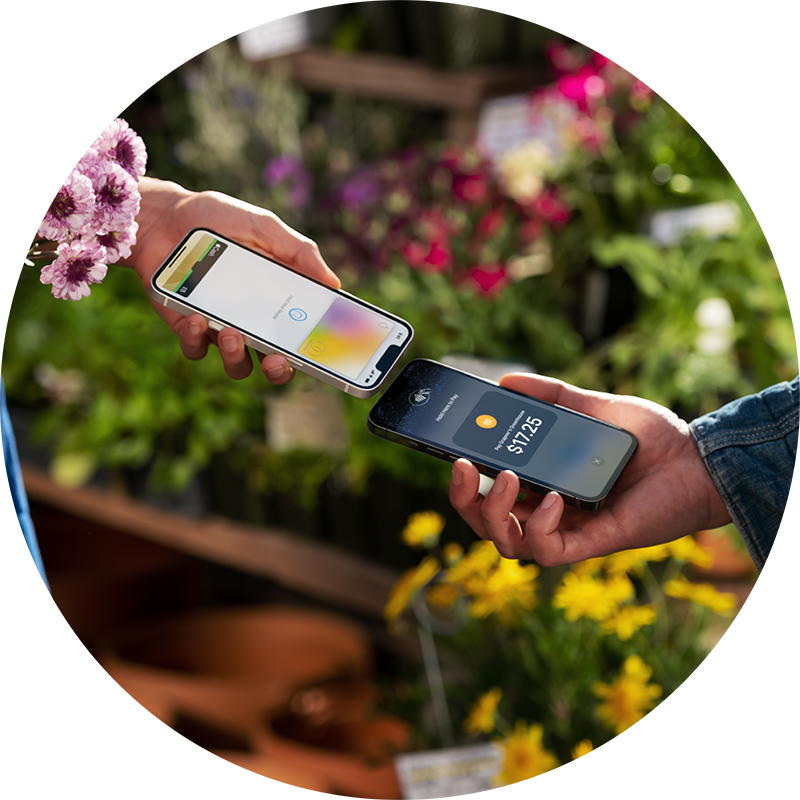 two mobile phones touching to use contactless pay